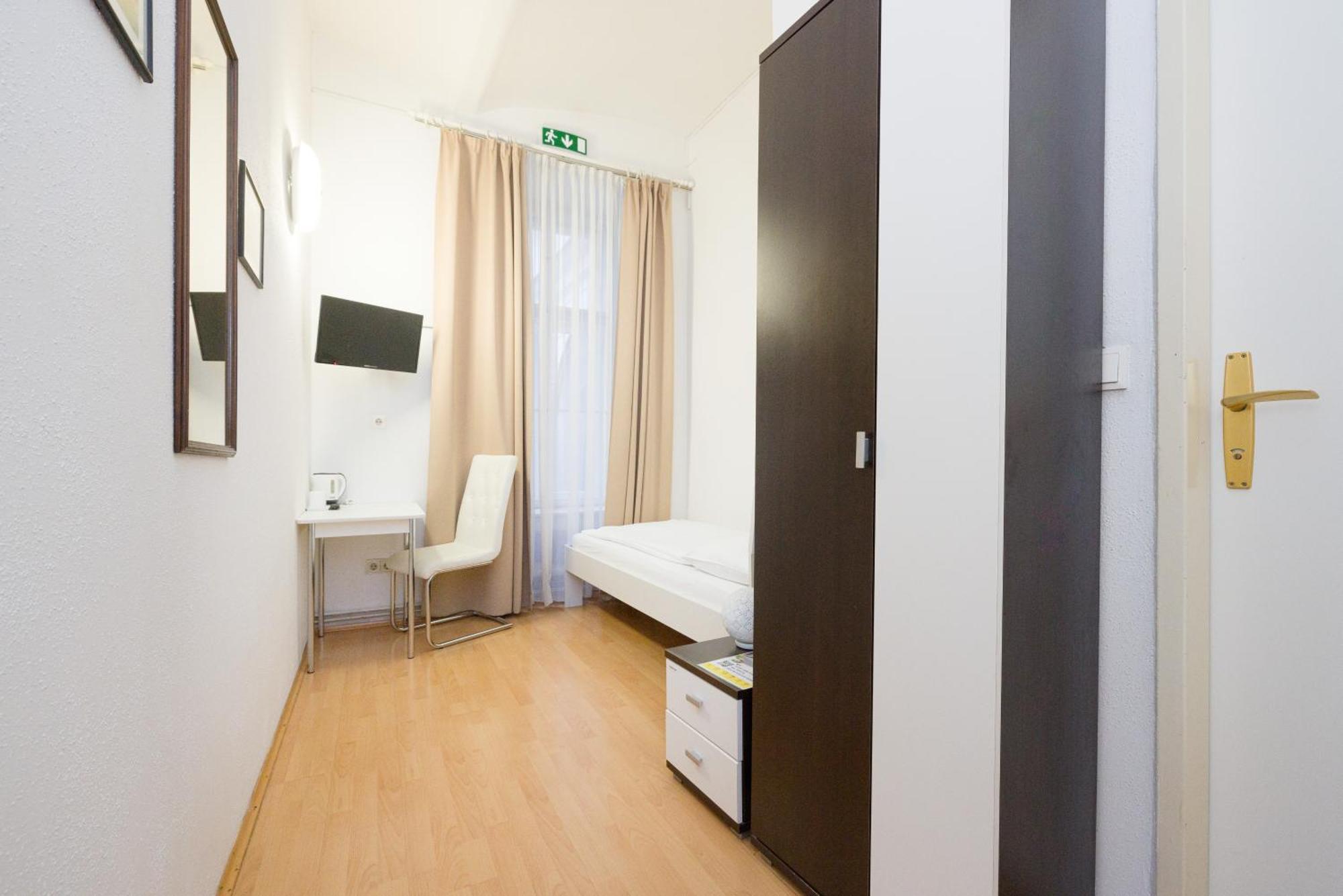 Pension Votiv Wien Rum bild